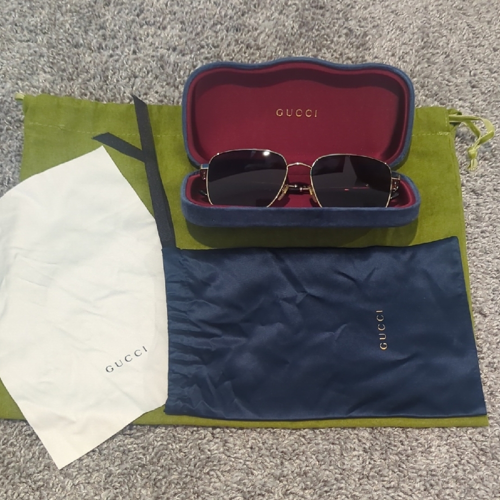 Gucci Black and Gold Sunglasses